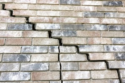 brick wall with stair step crack