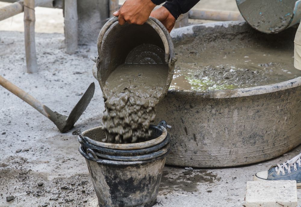 photo of wet cement being mixed